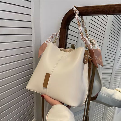 Bucket bag with fabric handle detail