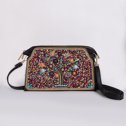 Embroidered crossbody bag with embellishments