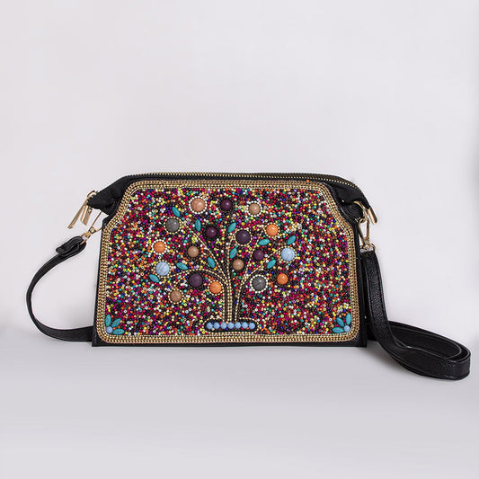 Embroidered crossbody bag with embellishments