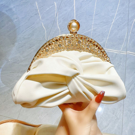 Satin clutch bag with metal frame