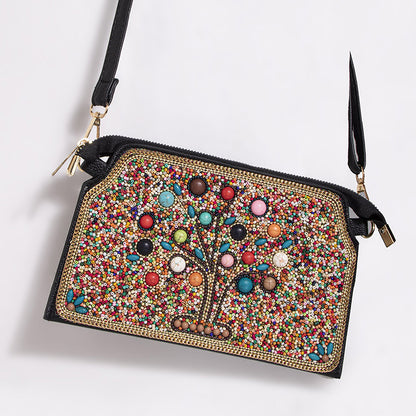 Embroidered crossbody bag with embellishments