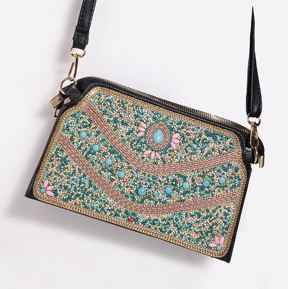 Embroidered crossbody bag with embellishments