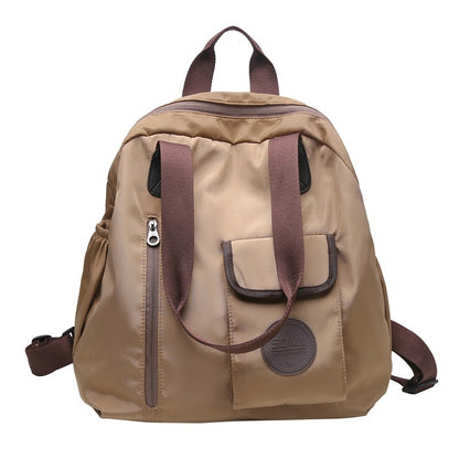 Soft backpack with flap and drawstring closure