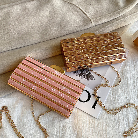 Rhinestone embellished clutch bag with chain strap