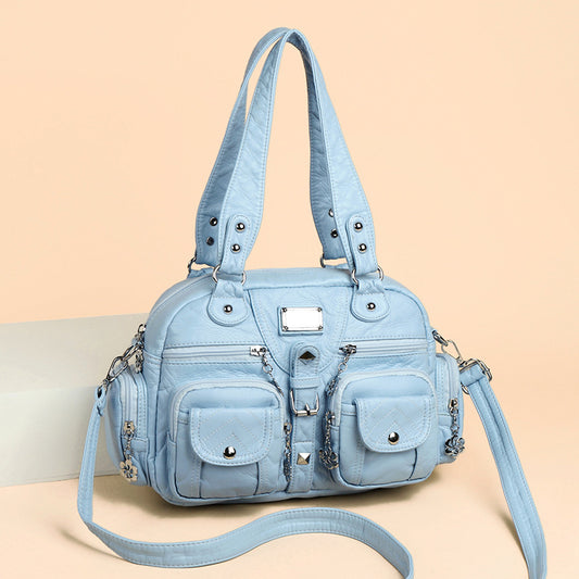 Multi-pocket handbag with detachable strap