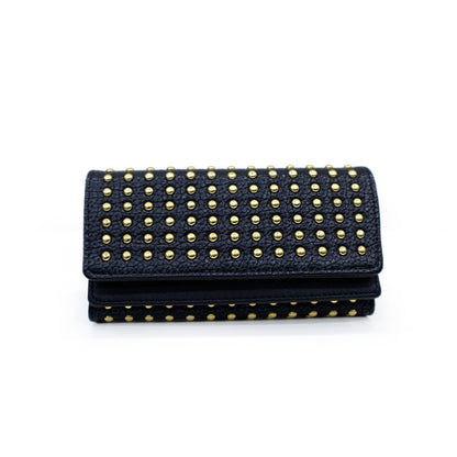 Studded wallet with flap closure