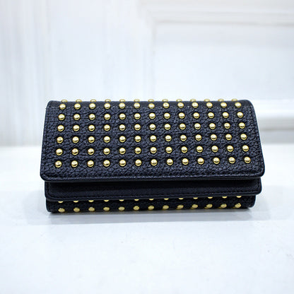 Studded wallet with flap closure