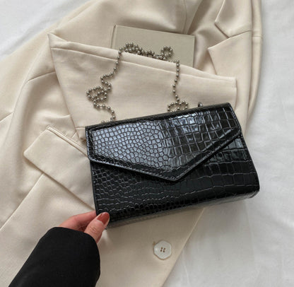 Envelope crossbody bag with chain strap