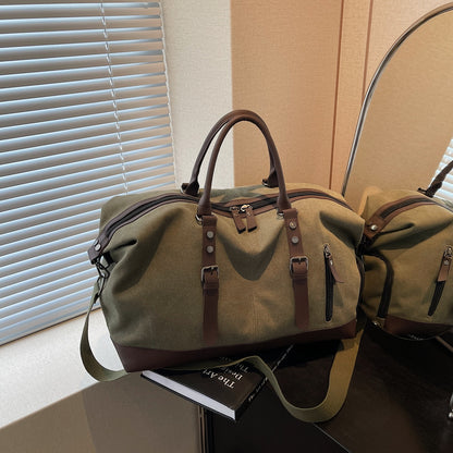 Canvas duffel bag with leather accents