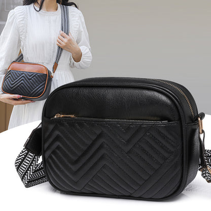 Quilted crossbody bag with front pocket
