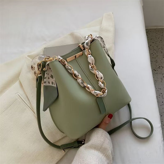 Bucket bag with fabric handle detail