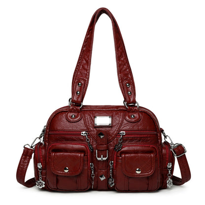 Multi-pocket handbag with detachable strap